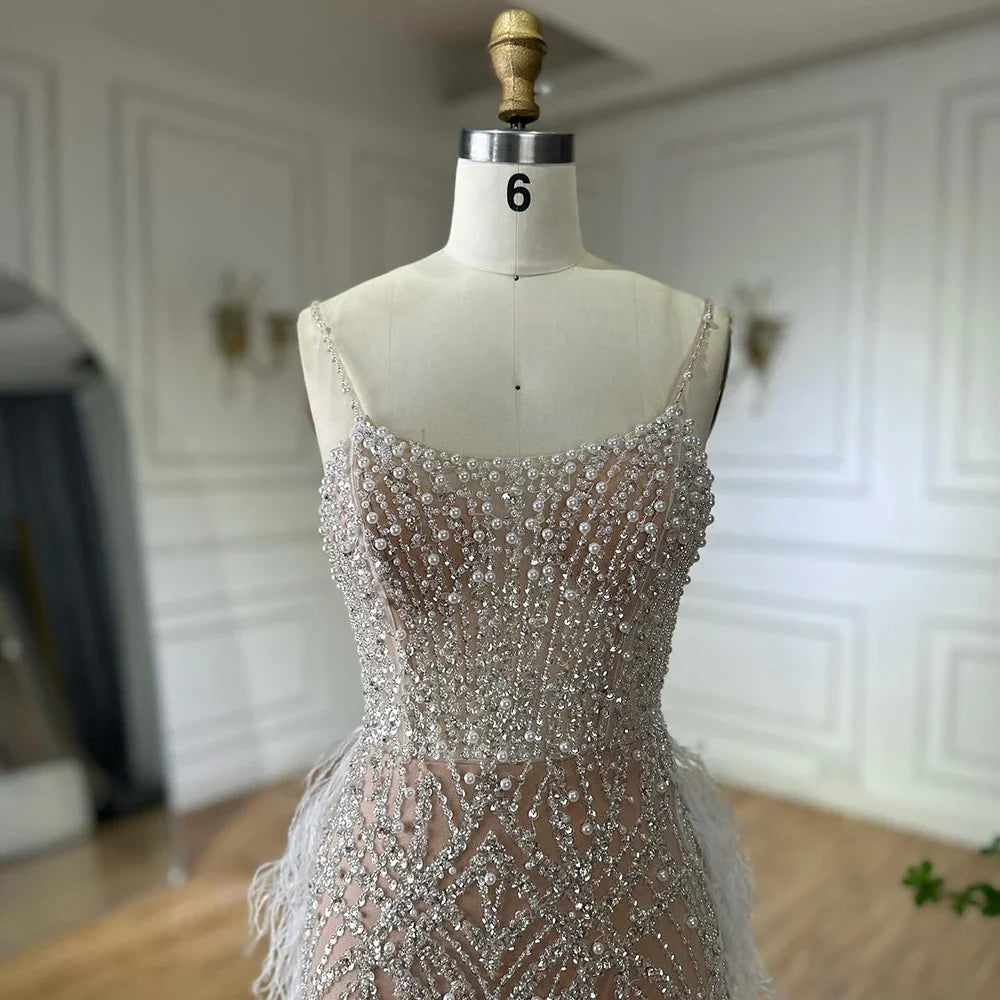 Luxury Dubai Arabic White Nude Spaghetti Strap Feathers Beaded Mermaid Evening Gown for Formal Occasion LA72823