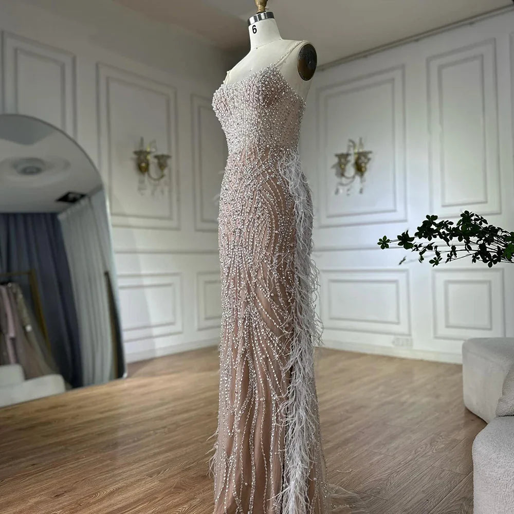 Luxury Dubai Arabic White Nude Spaghetti Strap Feathers Beaded Mermaid Evening Gown for Formal Occasion LA72823
