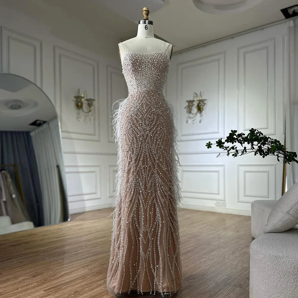 Luxury Dubai Arabic White Nude Spaghetti Strap Feathers Beaded Mermaid Evening Gown for Formal Occasion LA72823