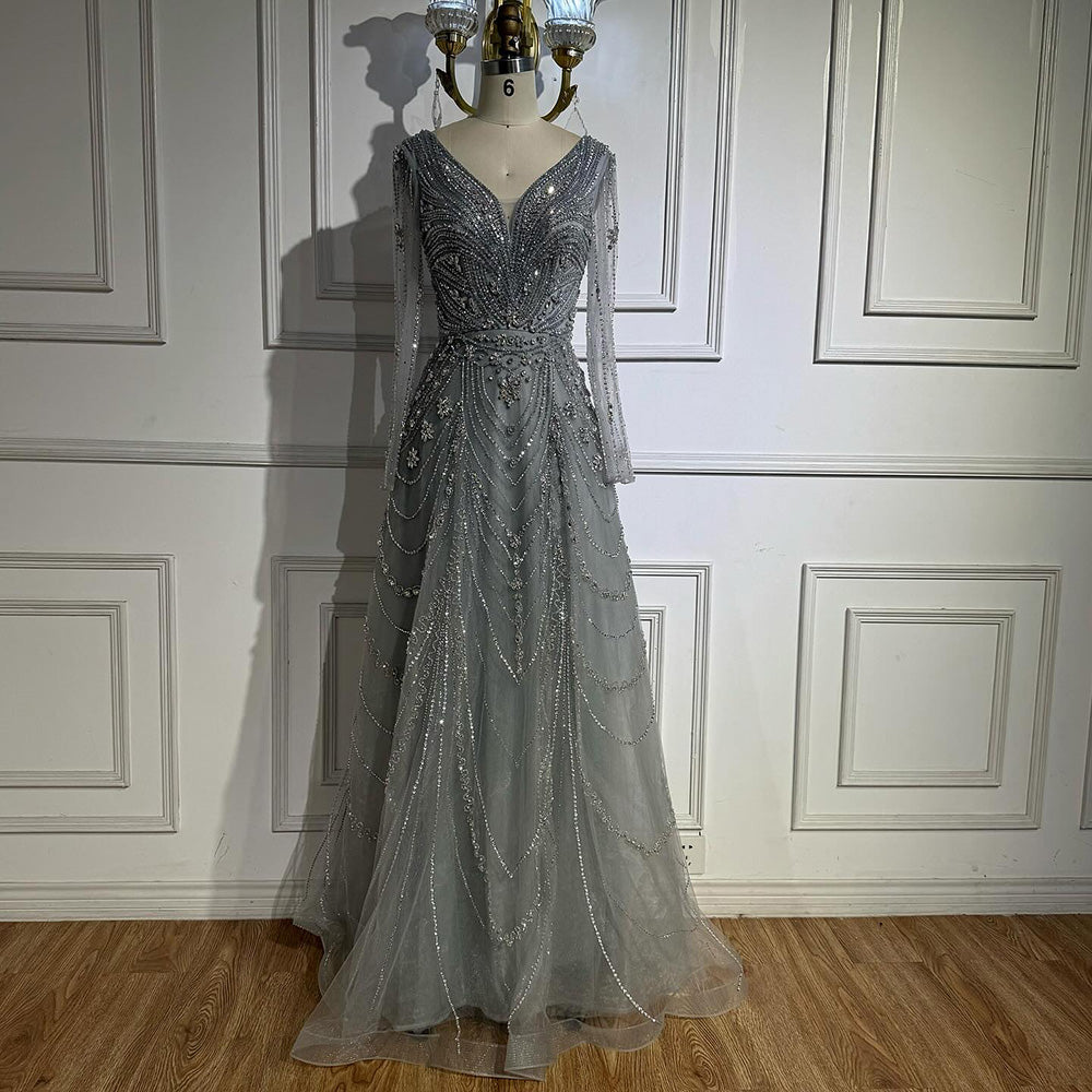 فستان سهرة فاخر وردي اللون مزين بالخرز بتصميم A لعام ٢٠٢٥، برقبة على شكل حرف V وأكمام طويلة LA73114