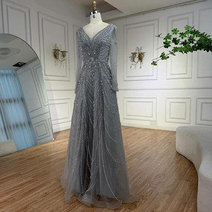 فستان سهرة فاخر وردي اللون مزين بالخرز بتصميم A لعام ٢٠٢٥، برقبة على شكل حرف V وأكمام طويلة LA73114