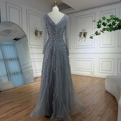 فستان سهرة فاخر وردي اللون مزين بالخرز بتصميم A لعام ٢٠٢٥، برقبة على شكل حرف V وأكمام طويلة LA73114