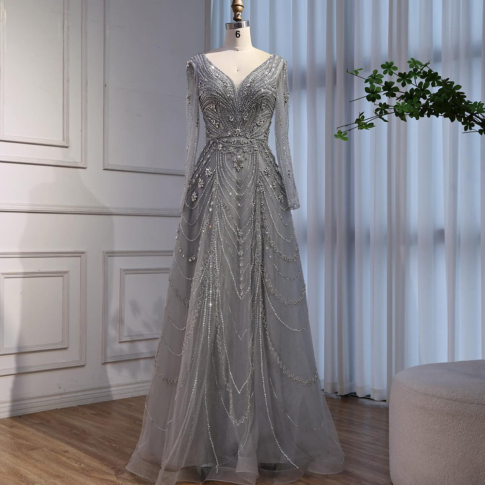 فستان سهرة فاخر وردي اللون مزين بالخرز بتصميم A لعام ٢٠٢٥، برقبة على شكل حرف V وأكمام طويلة LA73114