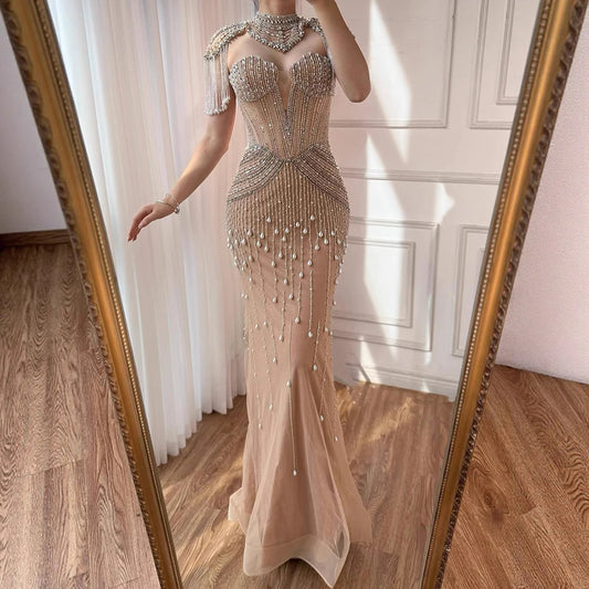Luxuriöses, nudefarbenes Meerjungfrauen-Abendkleid mit Perlen, Quasten und Perlenbesatz LA73183