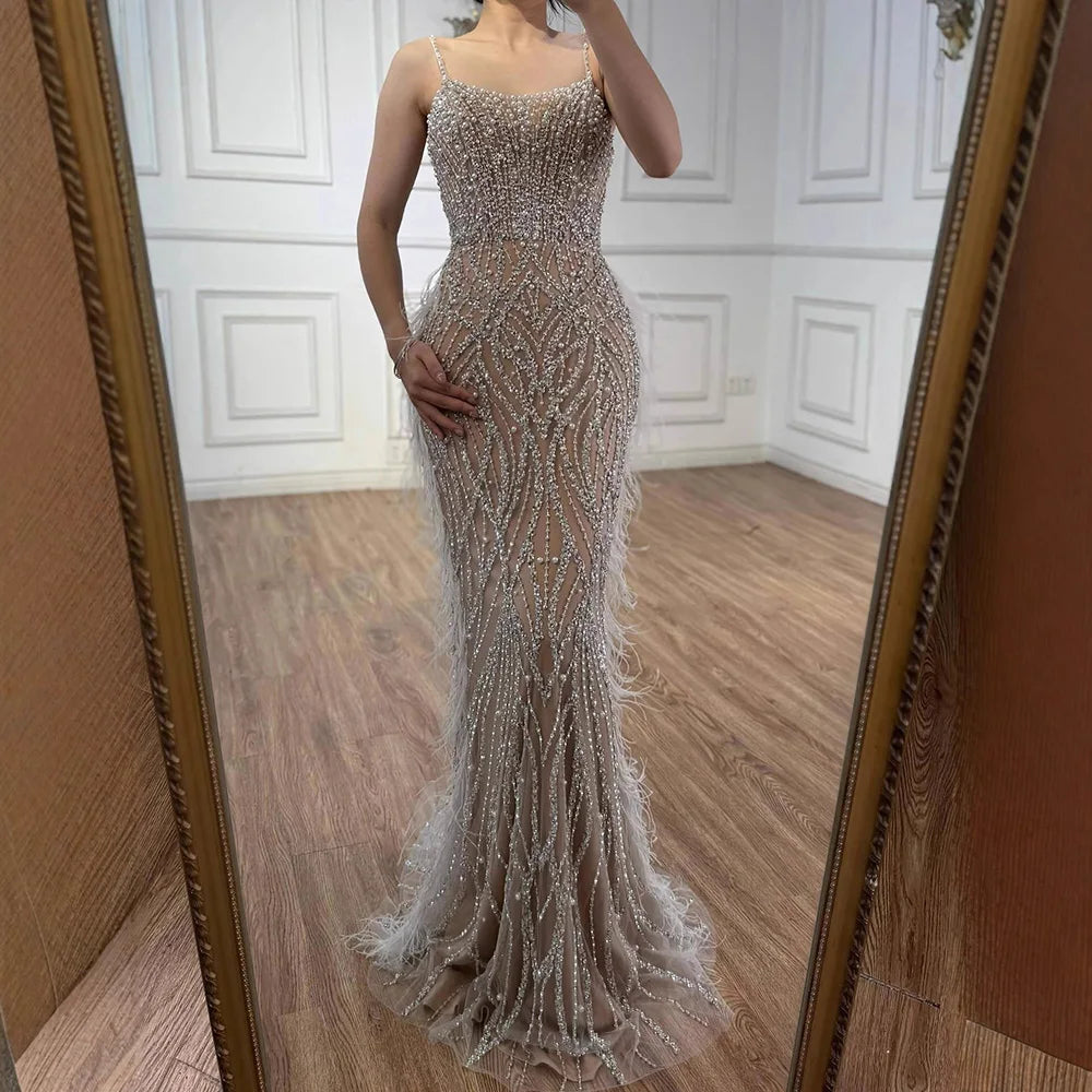 Luxury White Nude Spaghetti Strap Feather Beaded Mermaid Evening Gown LA72823